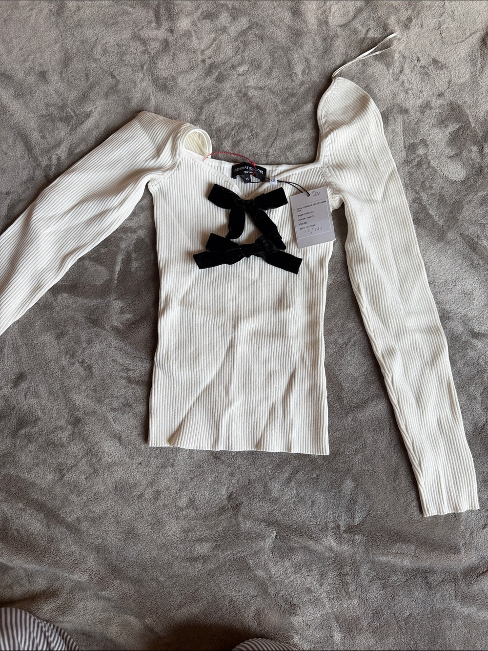 Generation Love White Ribbed Long-Sleeve Top with Black Bow Accents